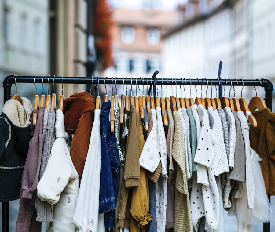 A rack of secondhand clothing on a neighborhood street